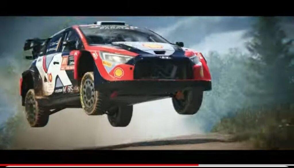 Rally car mid-jump on a dirt track